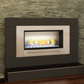 Close-up of a stainless steel framed Chad-O-Chef Classic Fireplace with a sleek back panel, showcasing modern fireplace design.