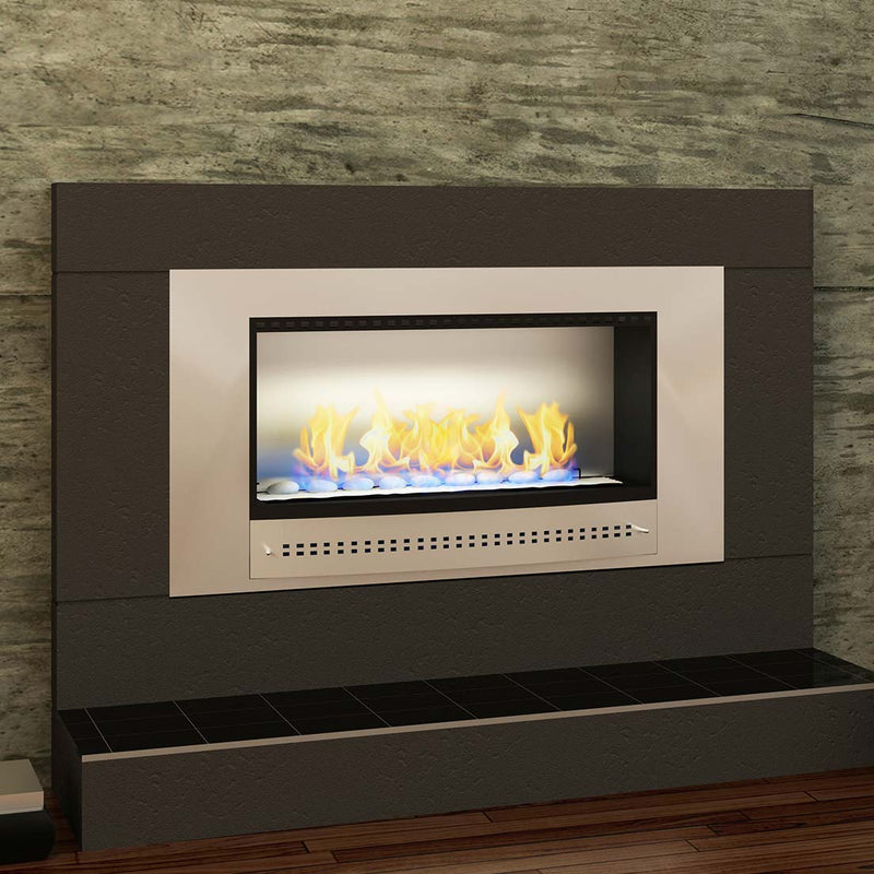 Close-up of a stainless steel framed Chad-O-Chef Classic Fireplace with a sleek back panel, showcasing modern fireplace design.