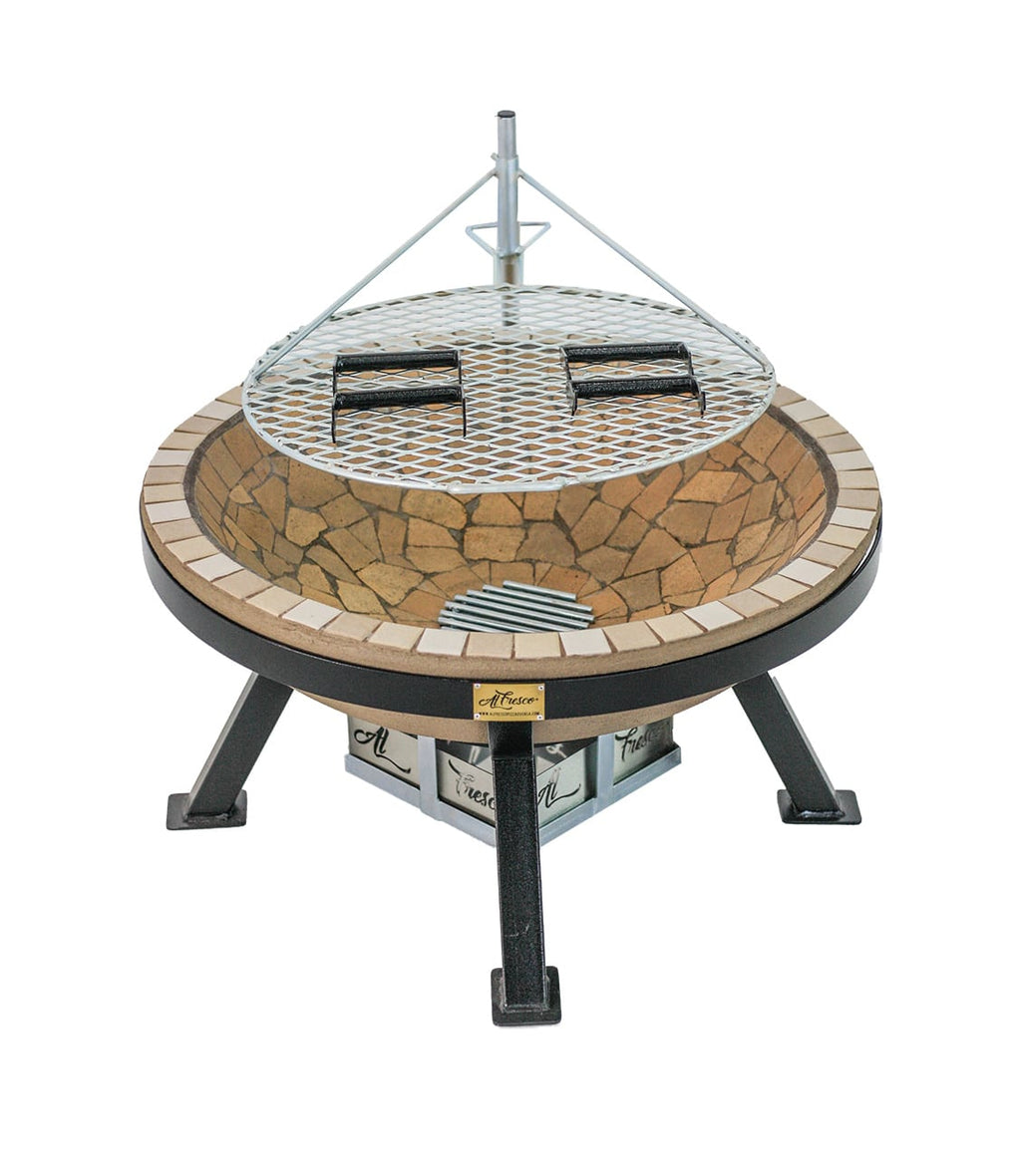 AlFresco Fire Pit by The Gas Boys with a braai grid, outdoor fire pit for cozy gatherings and outdoor cooking.