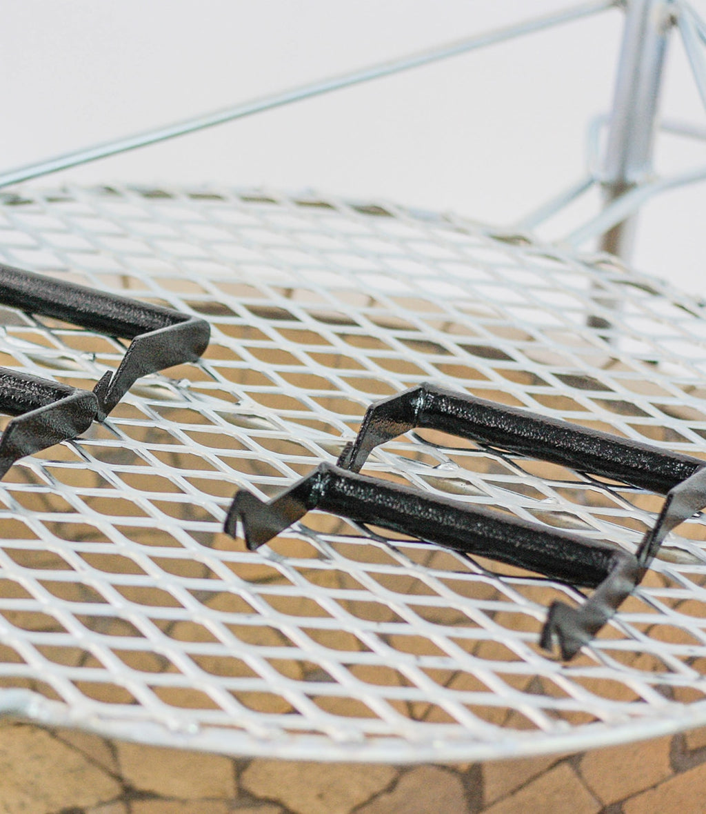AlFresco Fire Pits by The Gas Boys, featuring a fire pit with removable handles for outdoor heating and ambiance.