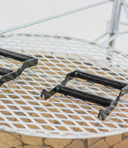 AlFresco Fire Pits by The Gas Boys, featuring a fire pit with removable handles for outdoor heating and ambiance.