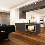 Chad-O-Chef double-sided fireplace showing modern living room with a sleek, open design and visible flames from both sides.