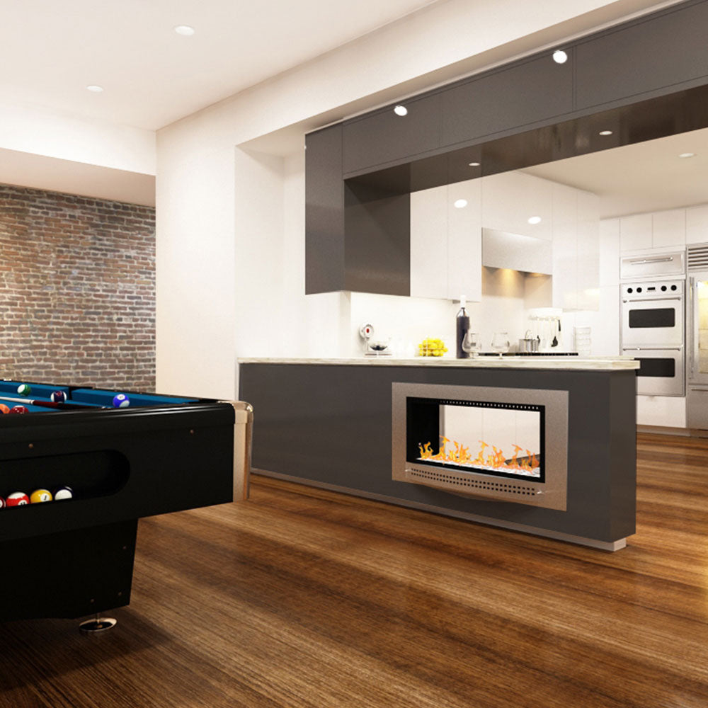 Chad-O-Chef double-sided fireplace showing modern living room with a sleek, open design and visible flames from both sides.