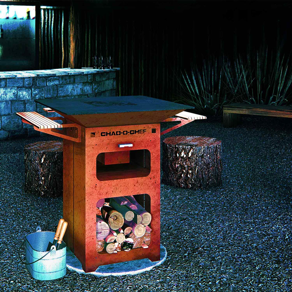 Chad-O-Chef Boma woodfire braai with outdoor cooking setup featuring a spacious grill and cozy outdoor patio.