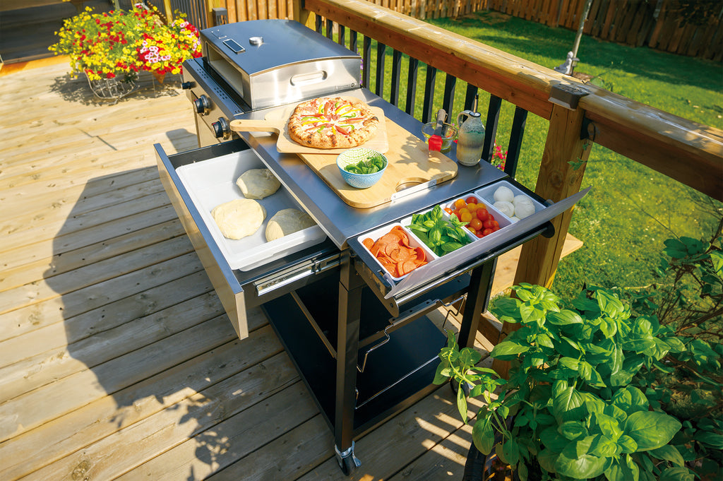 Cadac Braaimaxx entertainer gas braai with multiple burners and side shelves, ideal for outdoor cooking and entertaining.