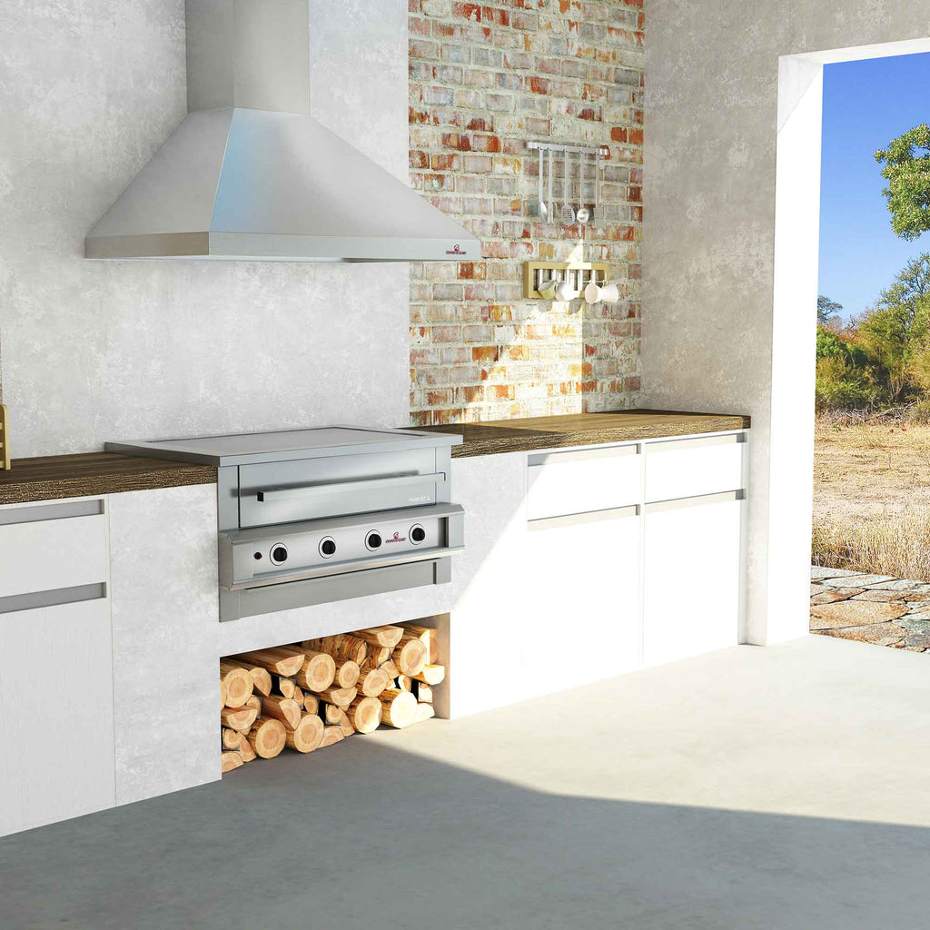 Chad-O-Chef hybrid braai outdoor cooking grill with stainless steel design and versatile grilling setup in a backyard setting.