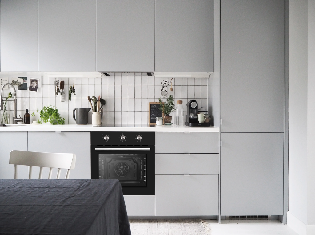 LUXE AM7006 60 cm electric oven with 70L capacity, featuring control knobs and digital display in a modern kitchen setting
