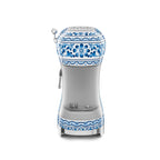 Smeg Dolce & Gabbana Blu Mediterraneo espresso coffee machine with sleek design and stainless steel finish.