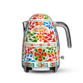 Smeg Dolce & Gabbana electric kettle by The Gas Boys, featuring a sleek design with a blue patterned exterior and metallic accents.