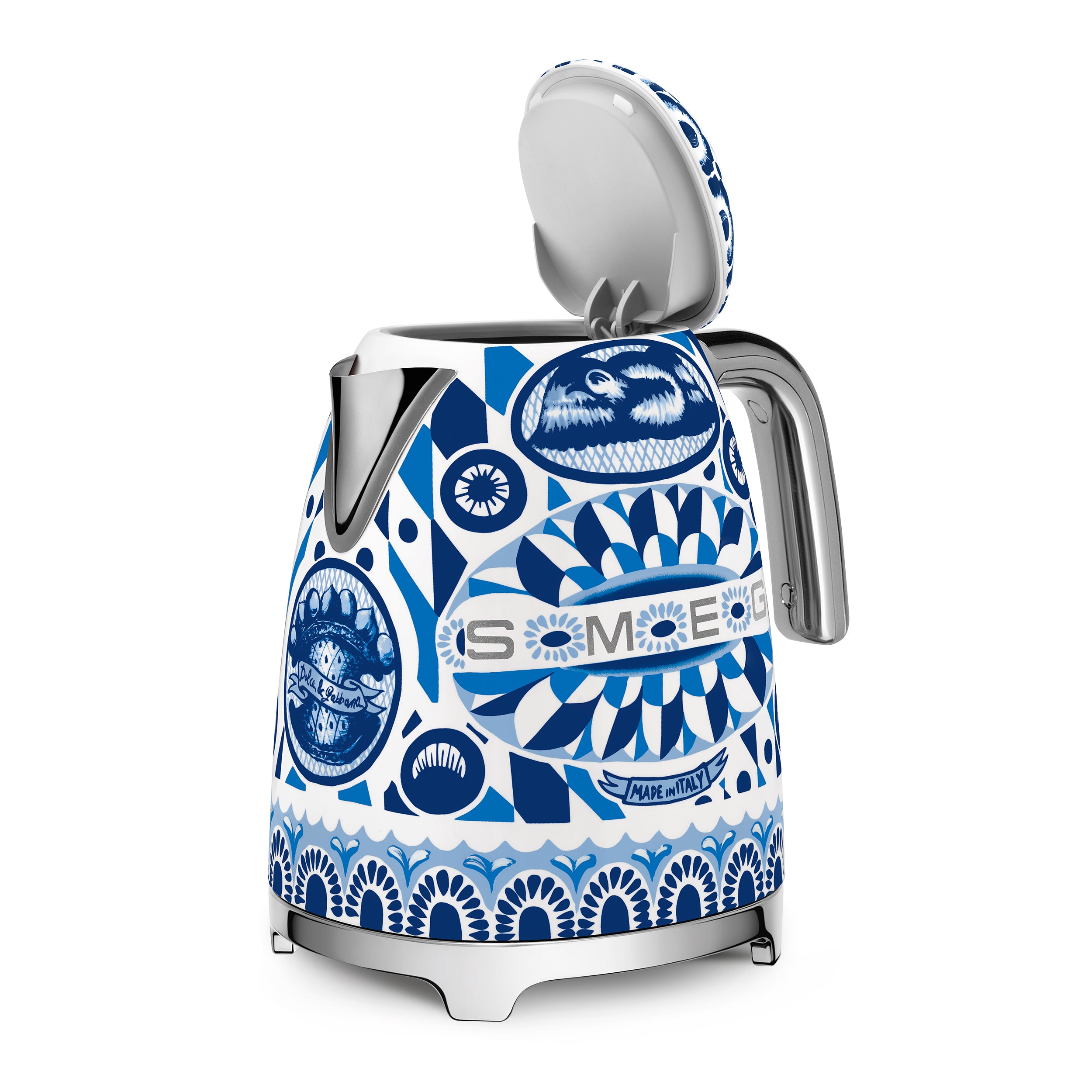 Smeg Dolce & Gabbana Blu Mediterraneo electric kettle with blue patterned design and stainless steel accents on a countertop