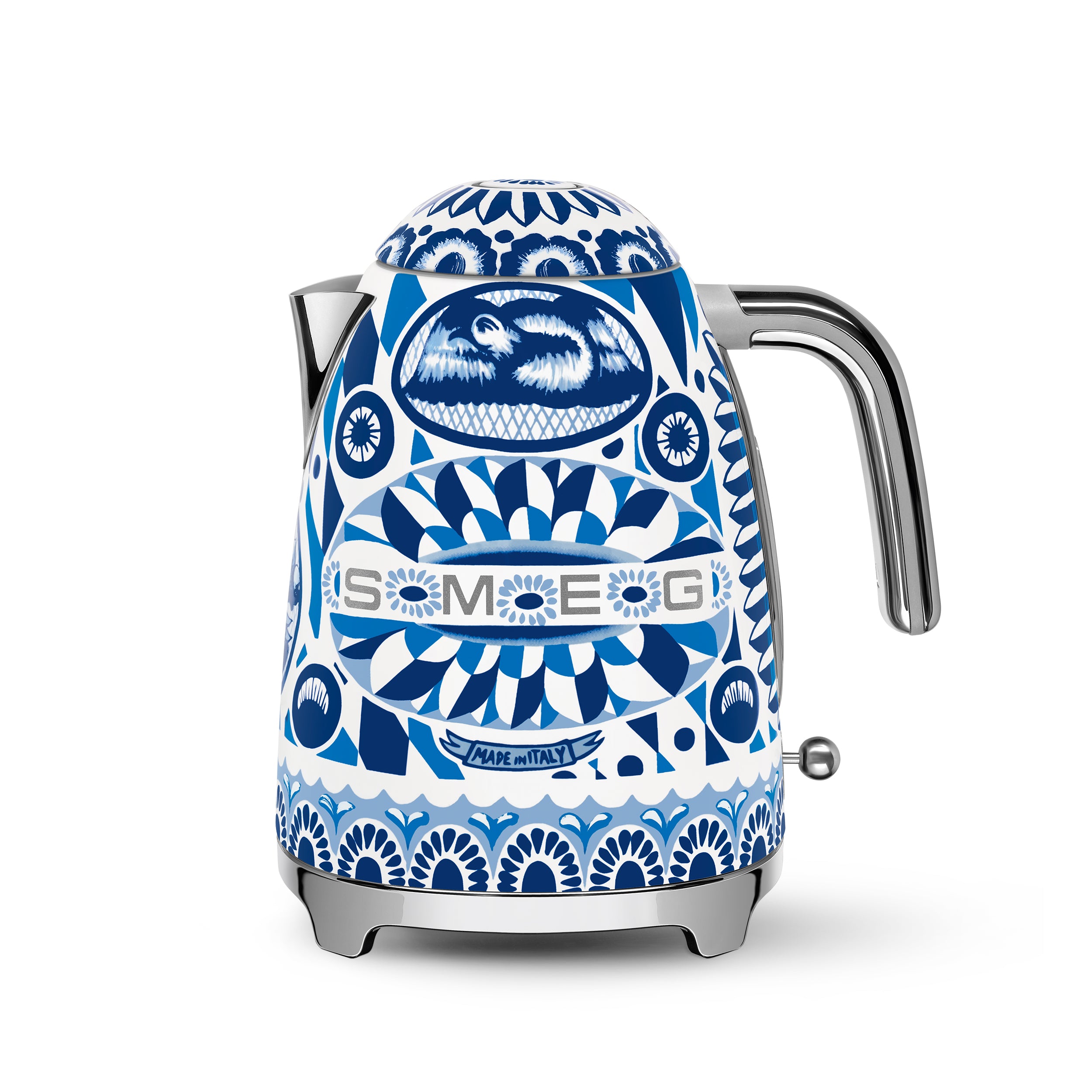 Smeg Dolce & Gabbana Blu Mediterraneo electric kettle with a sleek design and blue patterned exterior, on a kitchen countertop