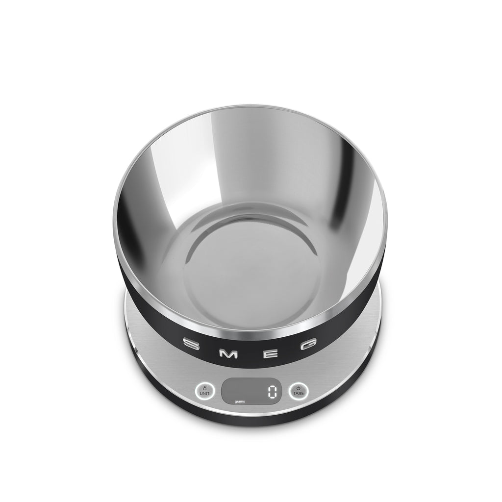 Smeg digital kitchen scale with a sleek black-and-white design and a digital display, perfect for precise food measurement.