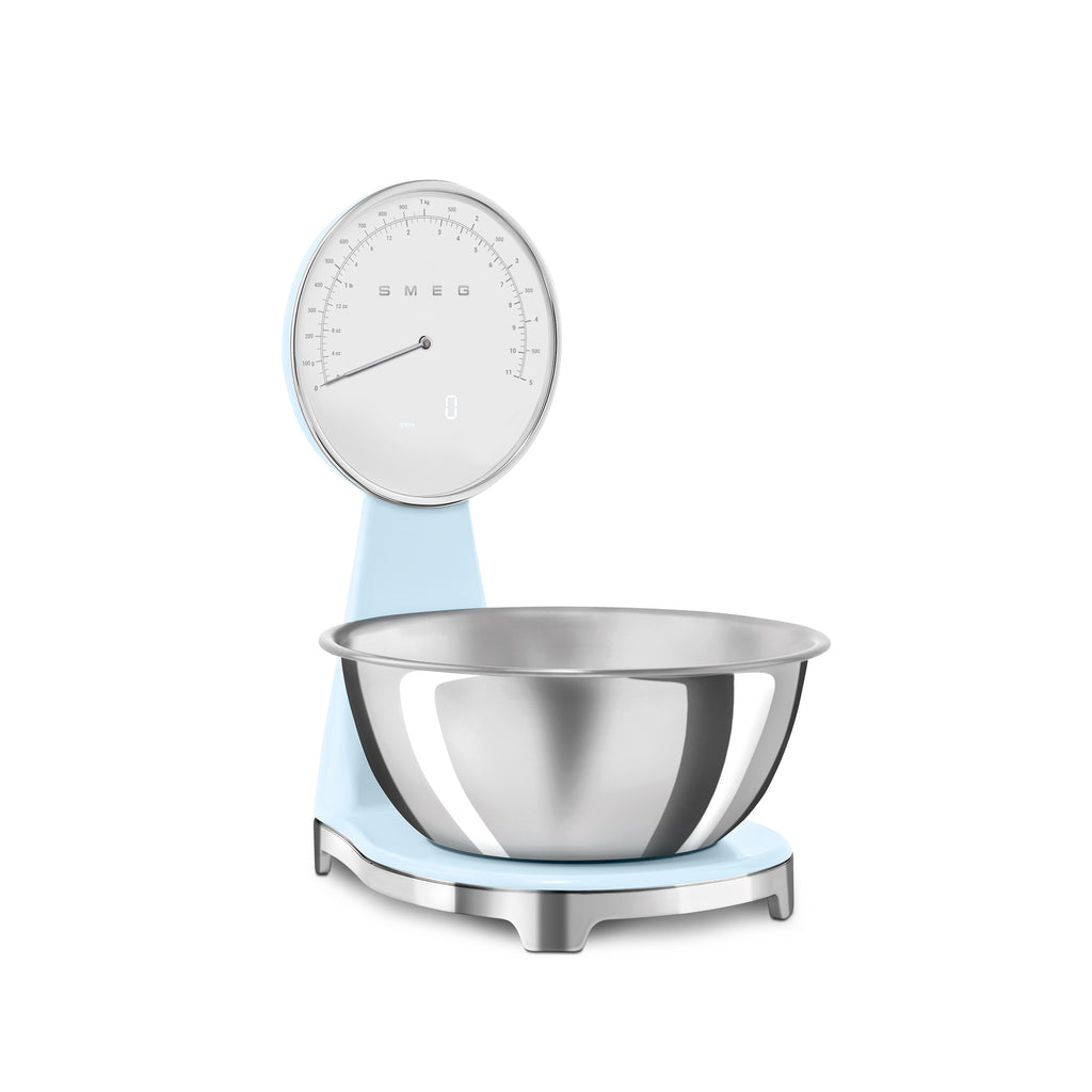 Smeg digital and analog kitchen scale with white and pink design, featuring a sleek display and measuring surface for precise weight.