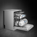 Smeg 60cm freestanding dishwasher in stainless steel with control panel and door handle, designed for efficient kitchen cleaning.