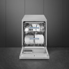 Smeg 60cm freestanding dishwasher in stainless steel, with control panel and open door revealing interior racks.