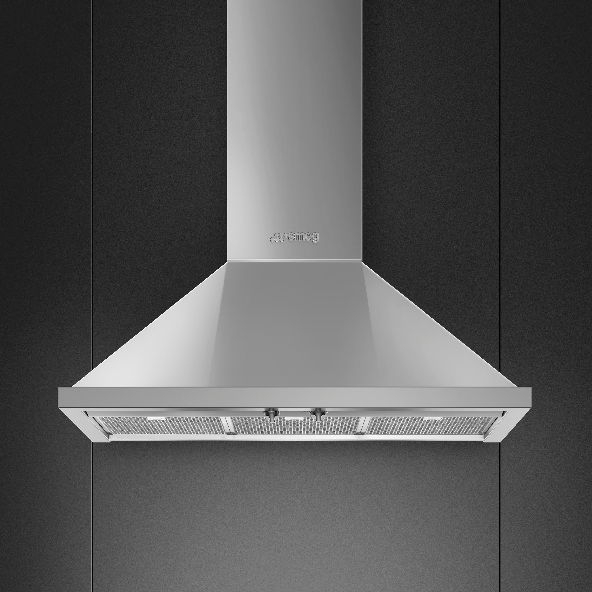 Smeg Portofino 90 cm extractor hood mounted on kitchen wall, with sleek stainless steel finish and control panel.