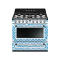 Smeg Dolce & Gabbana Blu Mediterraneo gas-electric cooker with sleek design and control knobs, featuring a modern cooking surface